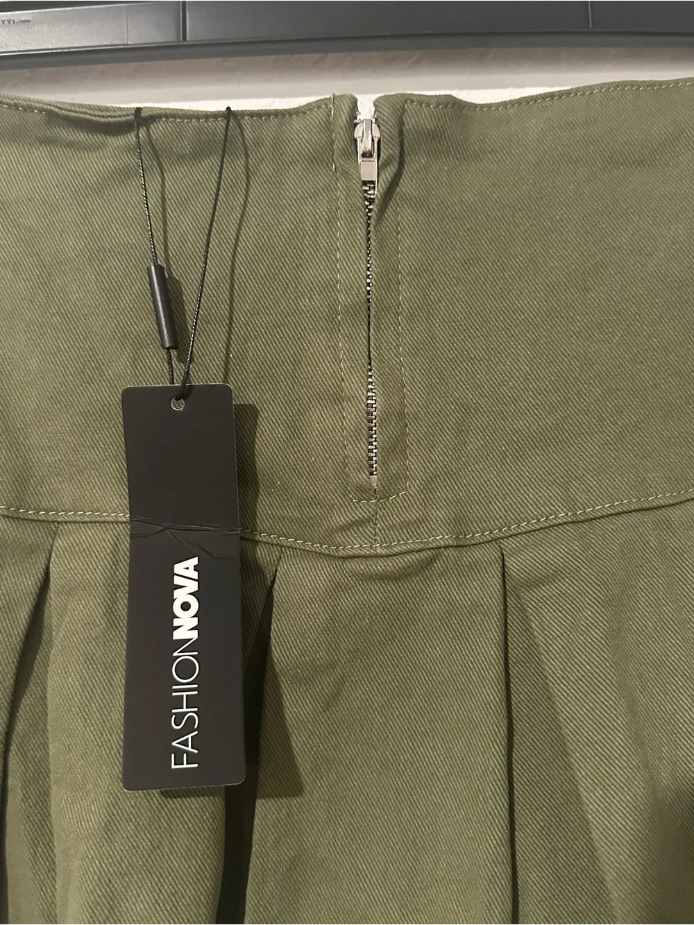 Fashion Nova Olive Pleated Mini Skirt with Zip Accents